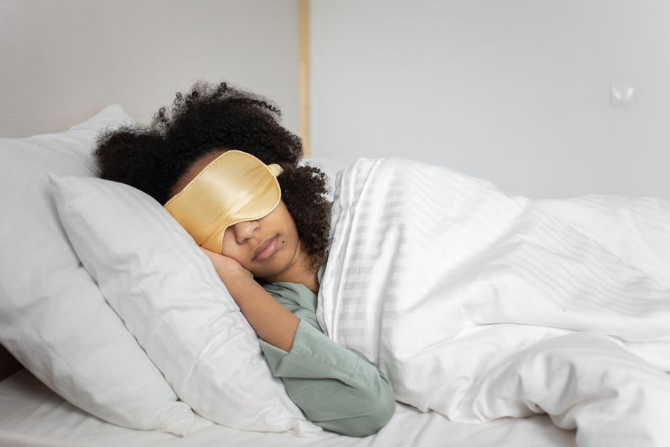 tired woman sleeping bed medical weight loss